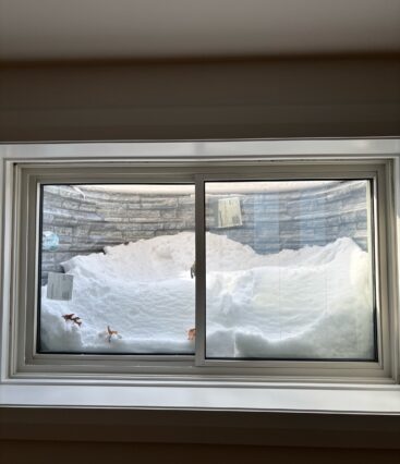 snow in window wells pile of snow inside egress window well in front of egress window egress solutions south jersey